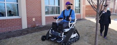 Wheelchair adaptations help young stroke survivor return to favorite outdoor activities